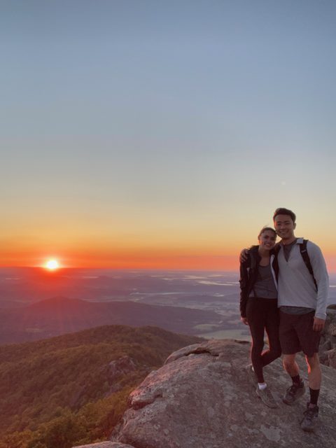 A summit sunset on a mountain hike